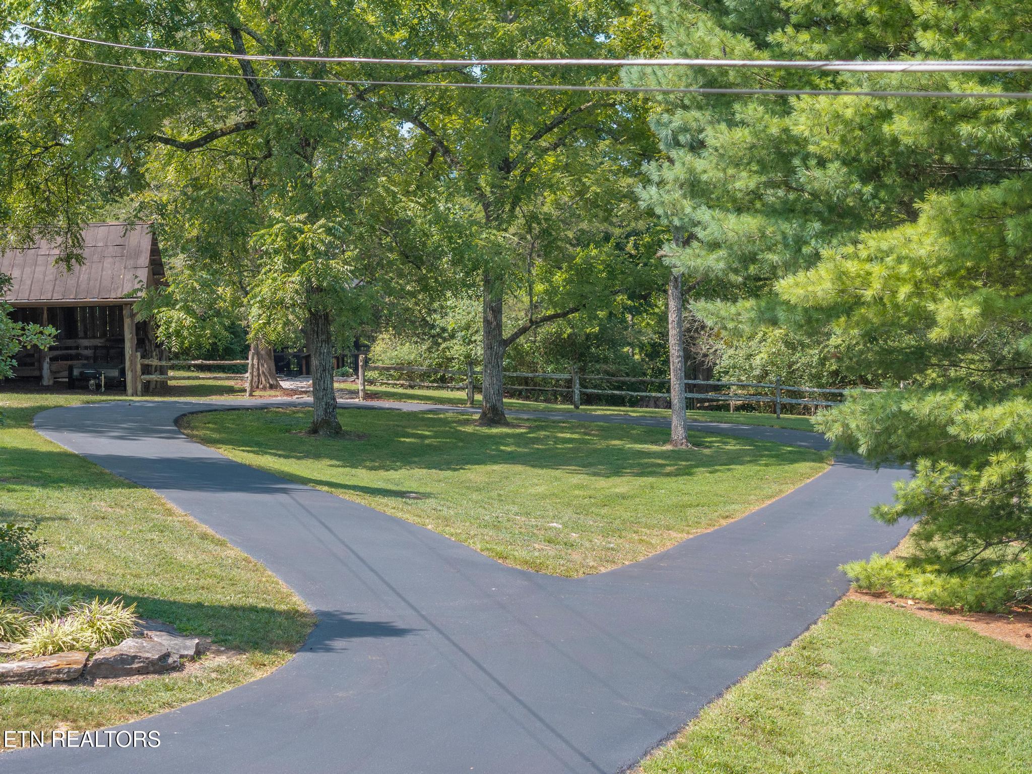 325 Lone Ridge Lane Clinton, TN 37716 - Photo 8 of 51 Driveway to Barn and Extra Parking