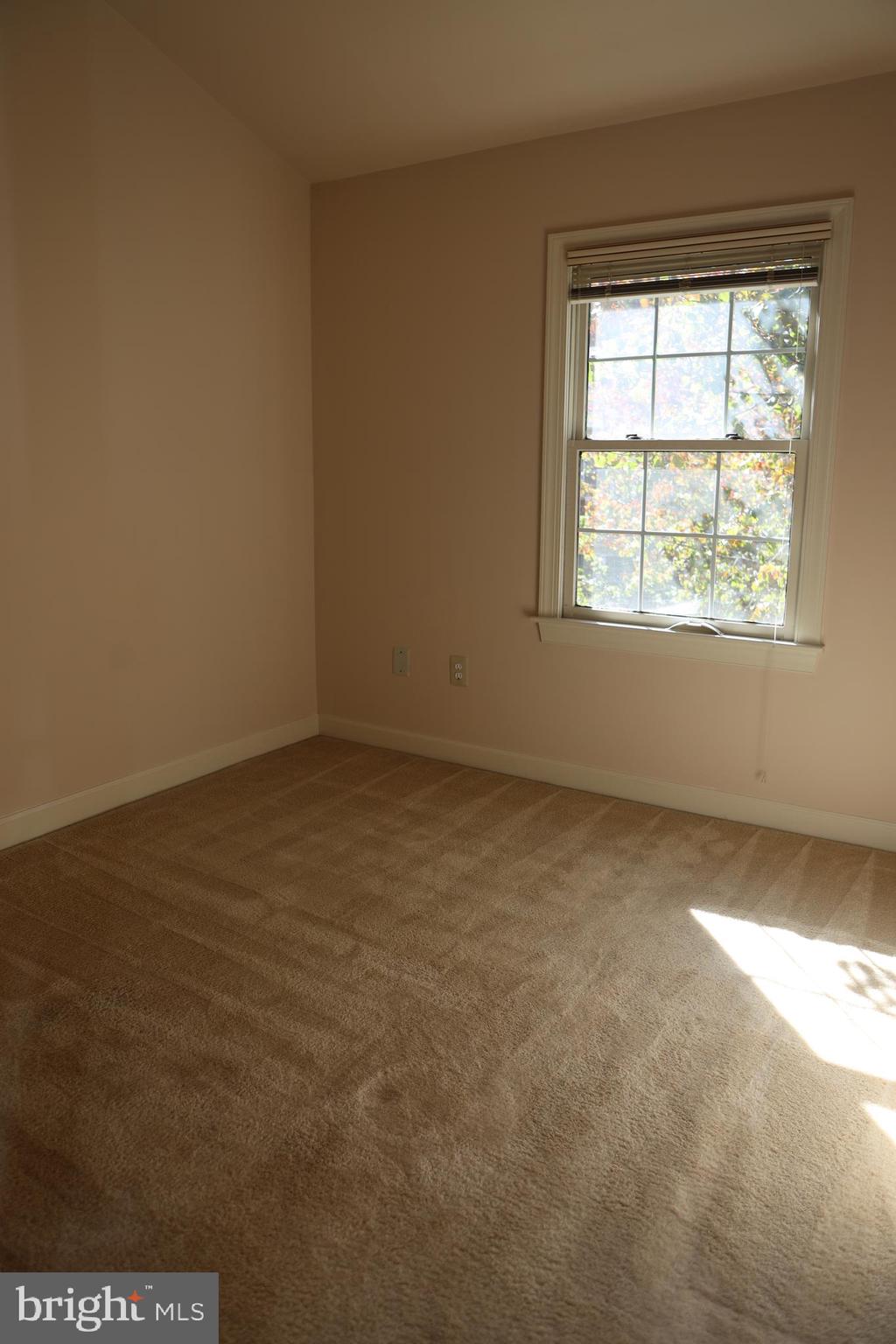 11223 Watermill Lane Silver Spring, MD 20902 - Photo 13 of 39 an empty room with a window