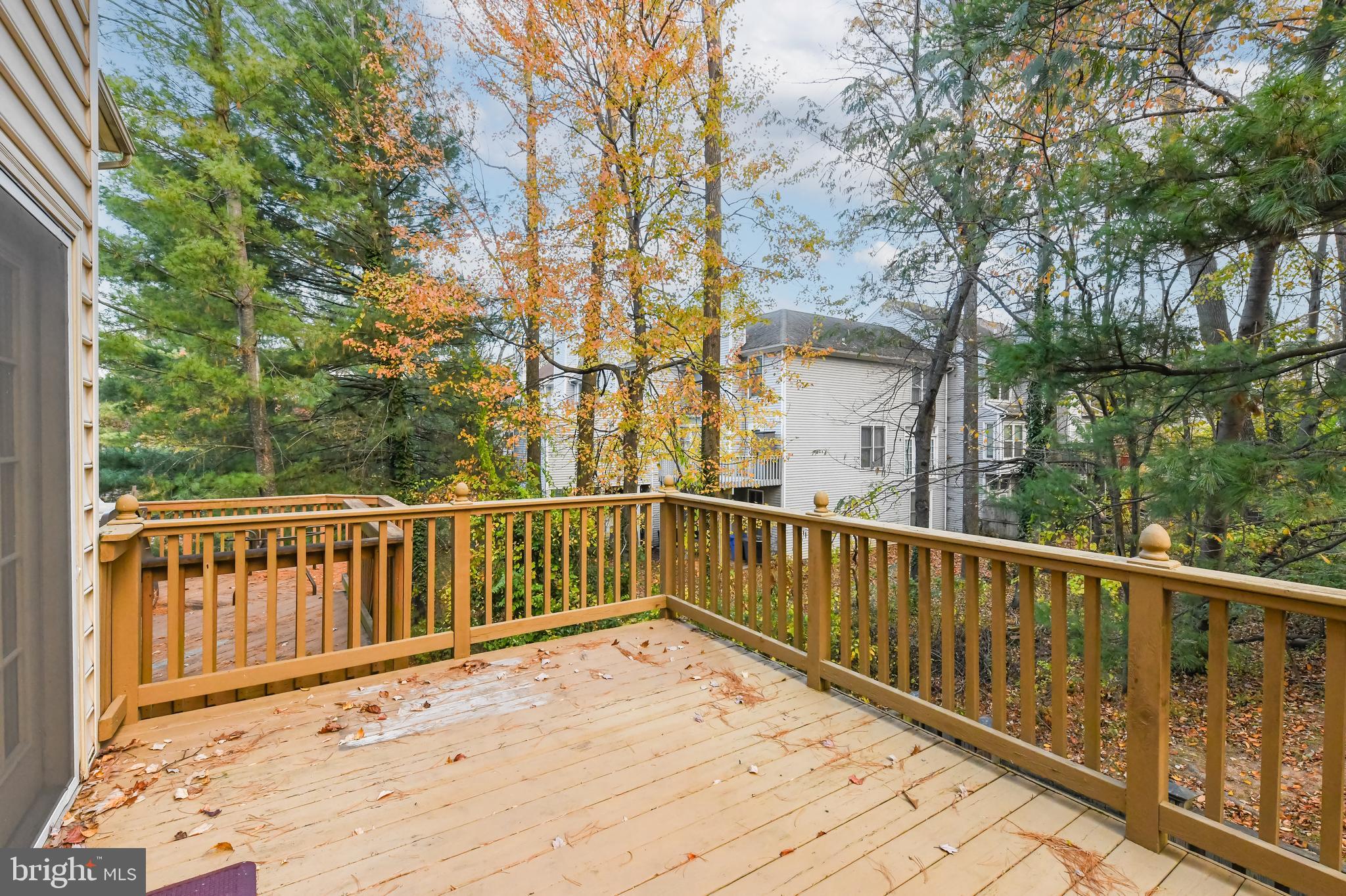 11223 Watermill Lane Silver Spring, MD 20902 - Photo 22 of 39 a view of balcony with wooden floor and fence