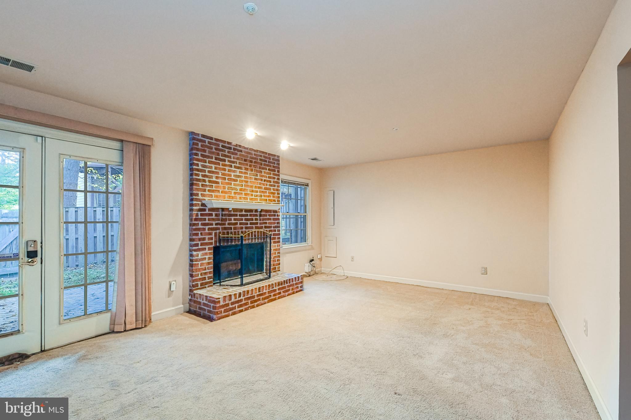 11223 Watermill Lane Silver Spring, MD 20902 - Photo 26 of 39 an empty room with fireplace