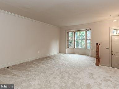 11223 Watermill Lane Silver Spring, MD 20902 - Photo 3 of 39 an empty room with windows