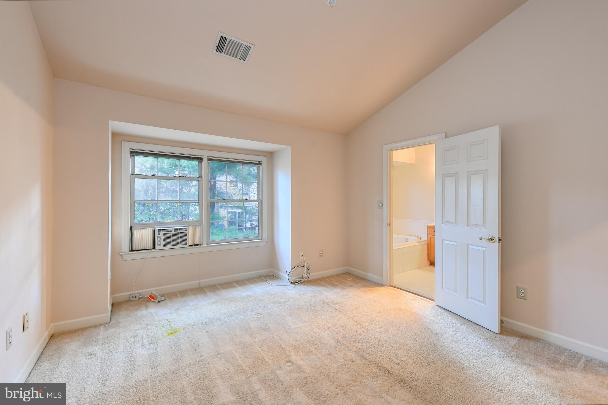 11223 Watermill Lane Silver Spring, MD 20902 - Photo 34 of 39 an empty room with windows