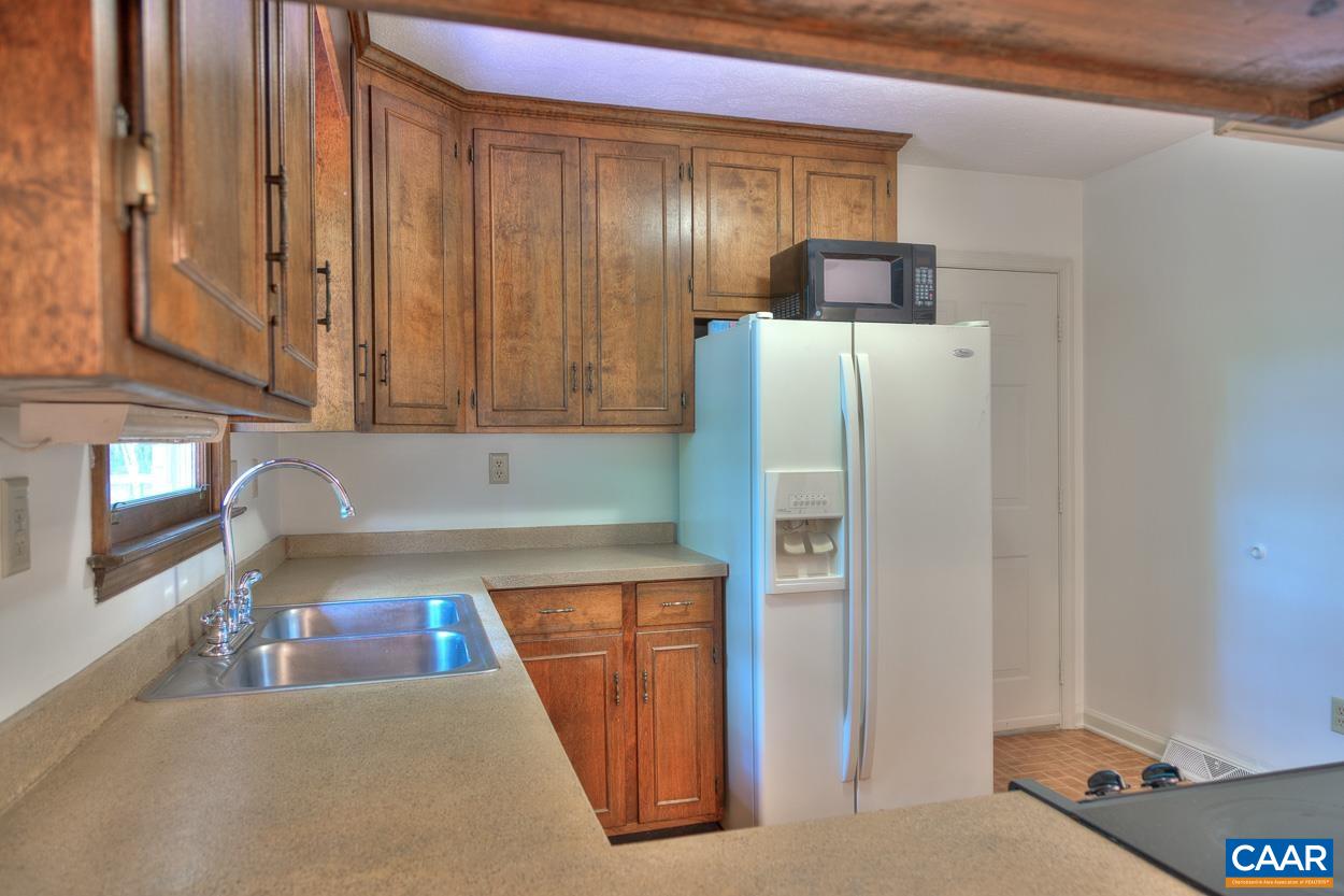 12 Begum Road Palmyra, VA 22963 - Photo 13 of 30 a kitchen with stainless steel appliances granite countertop a refrigerator and a stove top oven