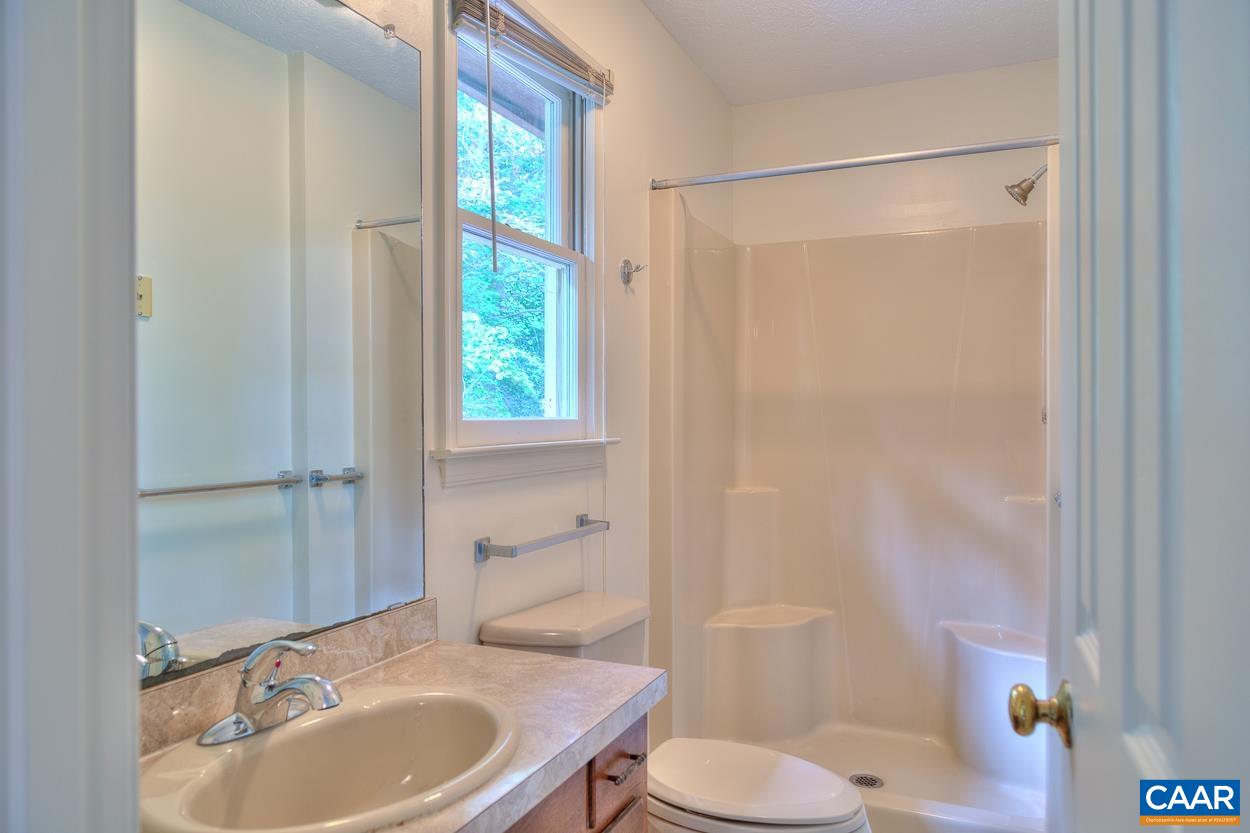 12 Begum Road Palmyra, VA 22963 - Photo 19 of 30 a bathroom with a sink toilet and shower