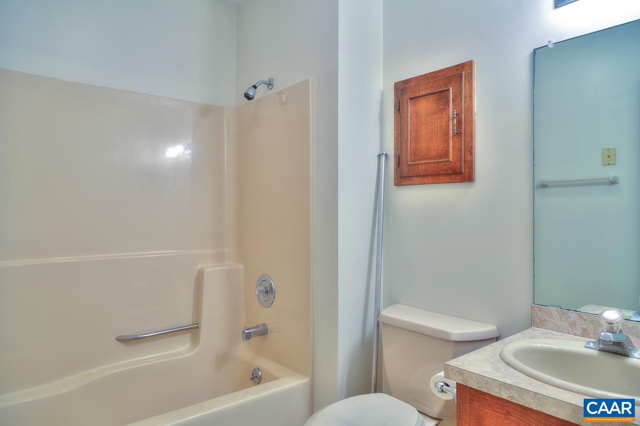 12 Begum Road Palmyra, VA 22963 - Photo 24 of 30 a bathroom with a sink a toilet and shower