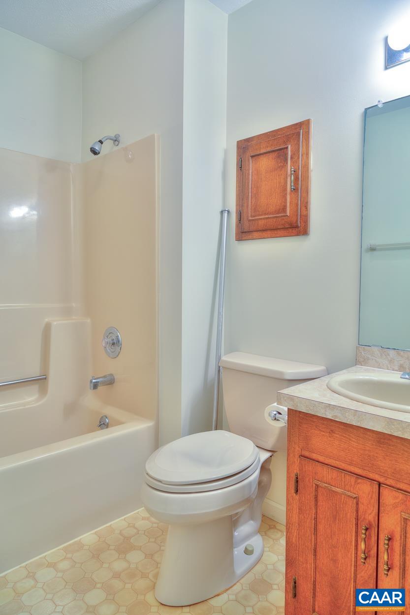 12 Begum Road Palmyra, VA 22963 - Photo 25 of 30 a bathroom with a sink a toilet and shower