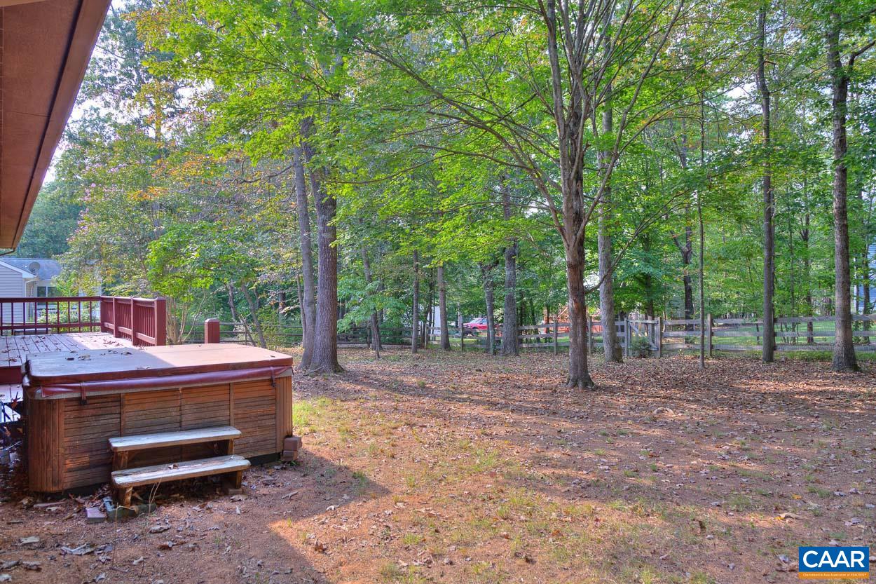 12 Begum Road Palmyra, VA 22963 - Photo 26 of 30 a backyard of a house with barbeque oven