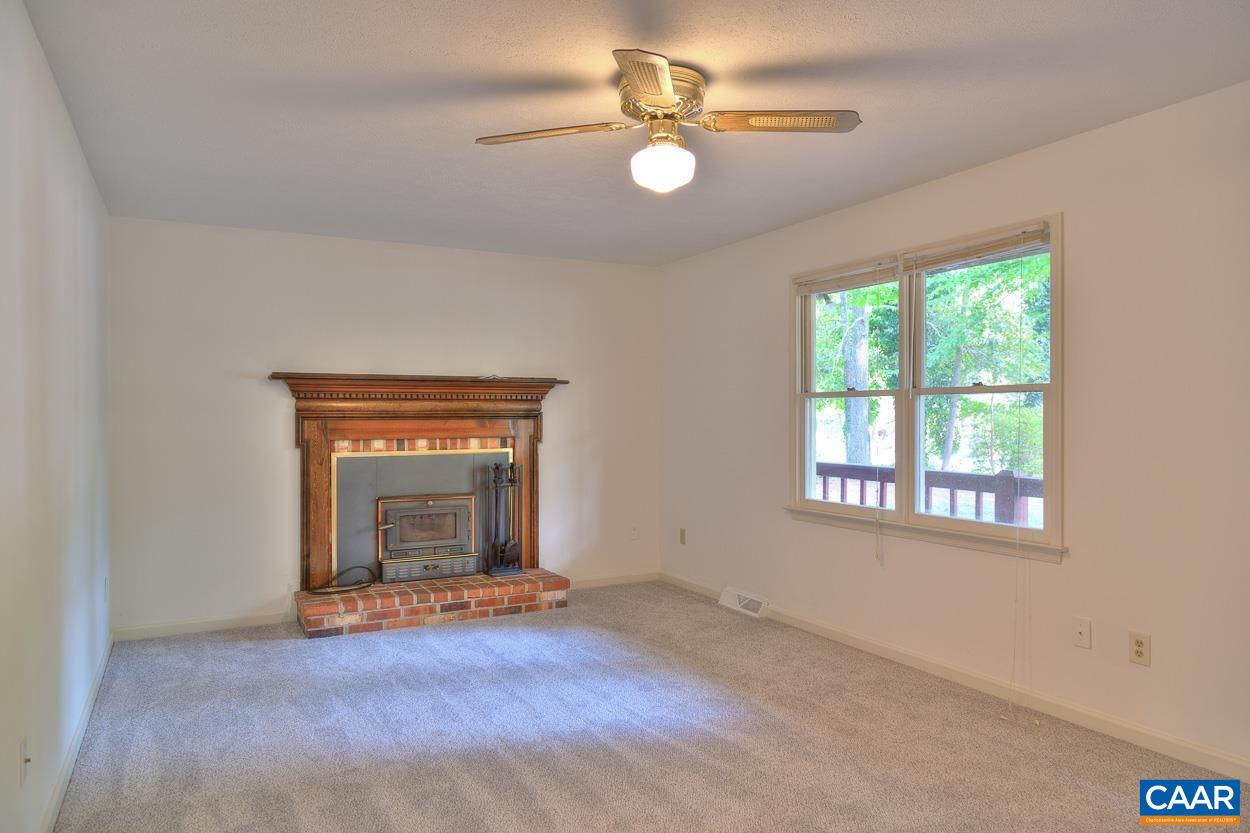 12 Begum Road Palmyra, VA 22963 - Photo 4 of 30 an empty room with windows and fireplace