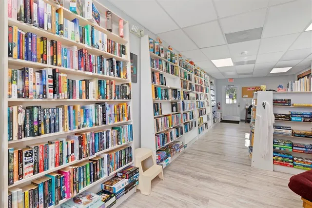 an outdoor space with seating area and garden view