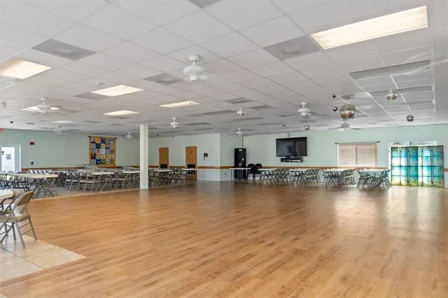 an aerial view of a house with a garden