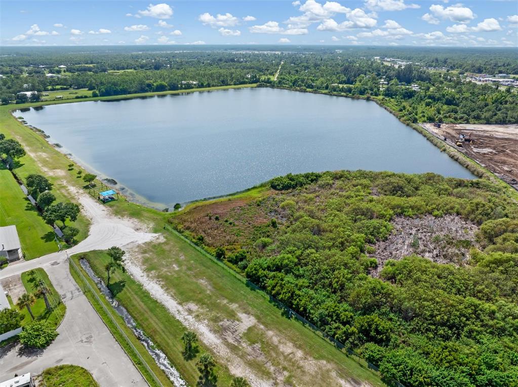176 West Manatee Loop Punta Gorda, FL 33950 - Photo 63 of 63 a view of a lake with a city view