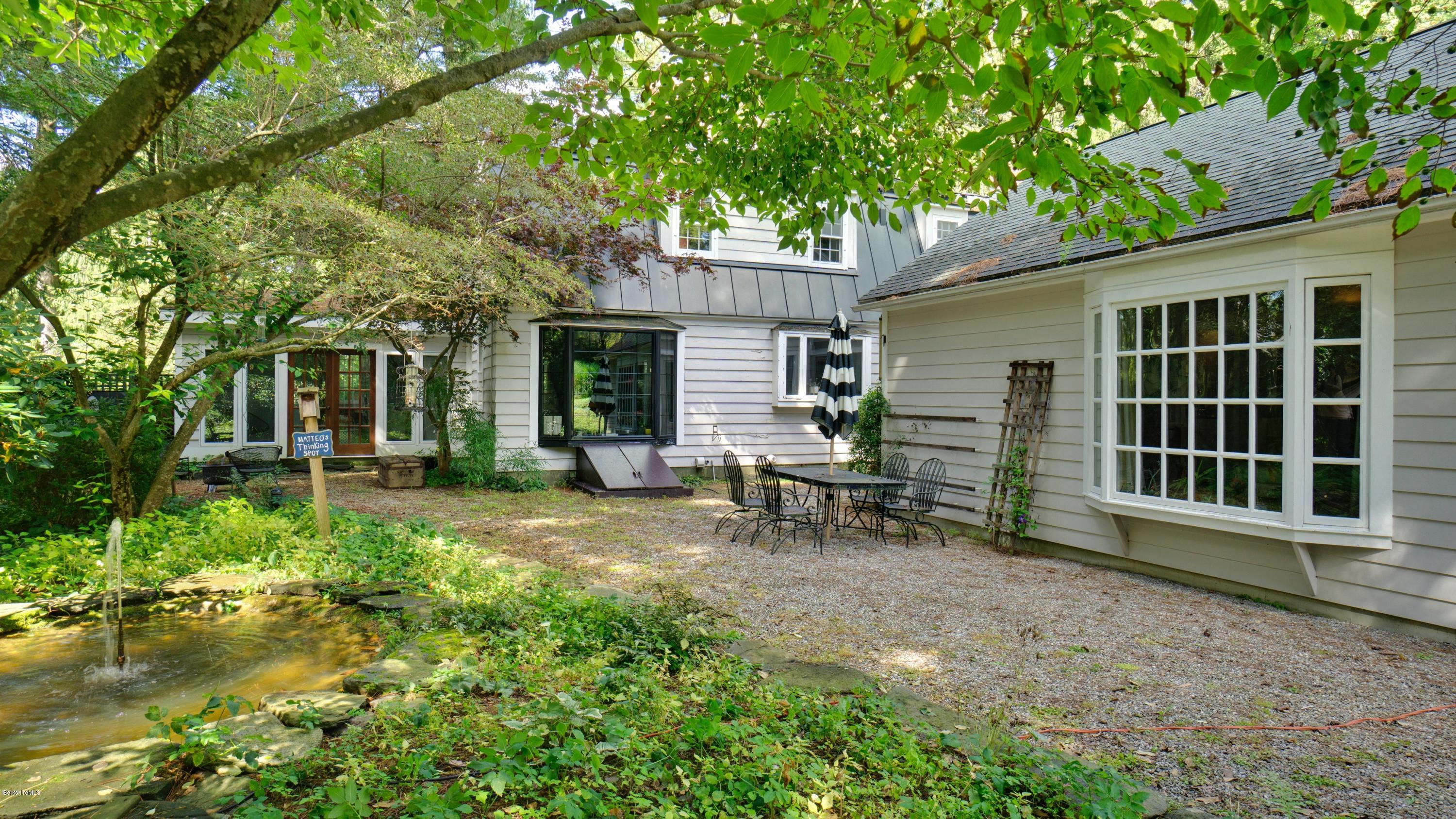 233 Holmes Road Pittsfield, MA 01201 - Photo 31 of 34 Backyard with fountain