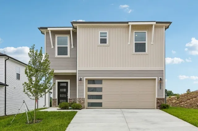 a front view of house with yard