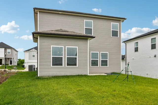 a view of livingroom with a table and chairs