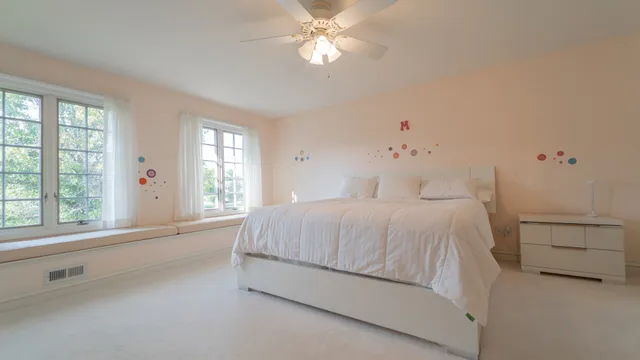 a kitchen with stainless steel appliances granite countertop a sink and a microwave