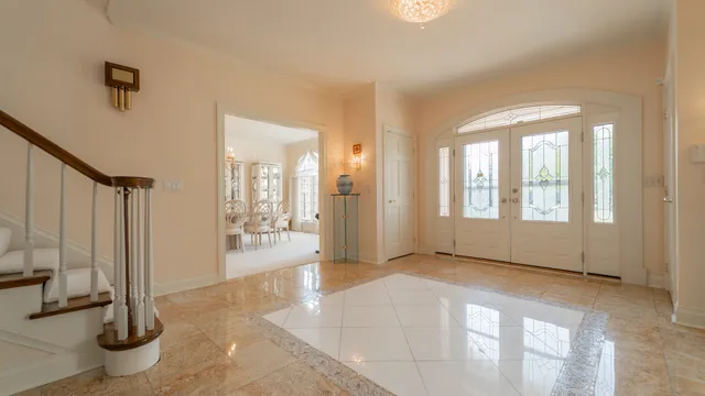 a view of entryway with stairs and furniture