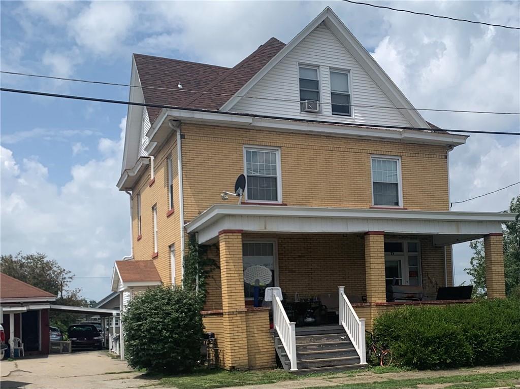 a front view of a house with windows