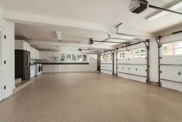 a front view of house along with green space