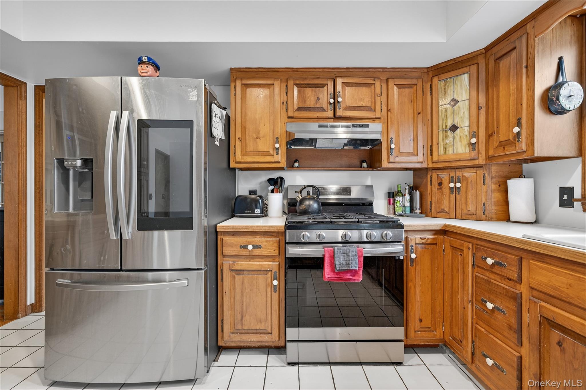 214 Dubois Road Gardiner, NY 12561 - Photo 12 of 38 a kitchen with stainless steel appliances granite countertop a refrigerator sink and stove