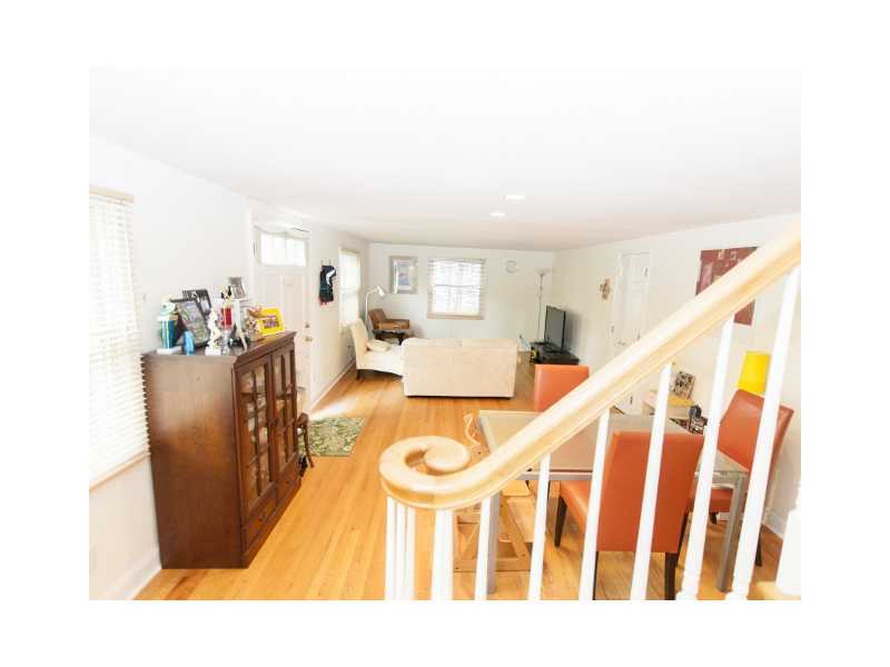 23 Hoover Road Riverside, CT 06878 - Photo 4 of 18 a view of a living room with furniture and wooden floor