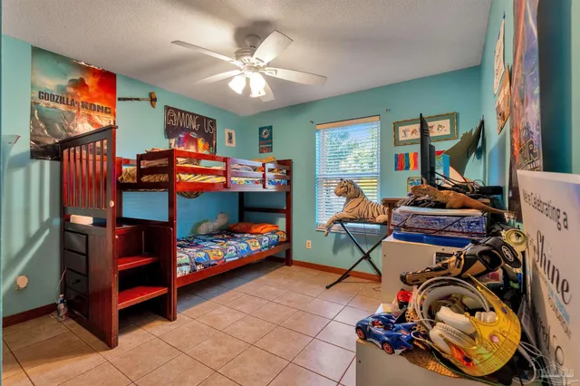 a small garden covered with tall trees