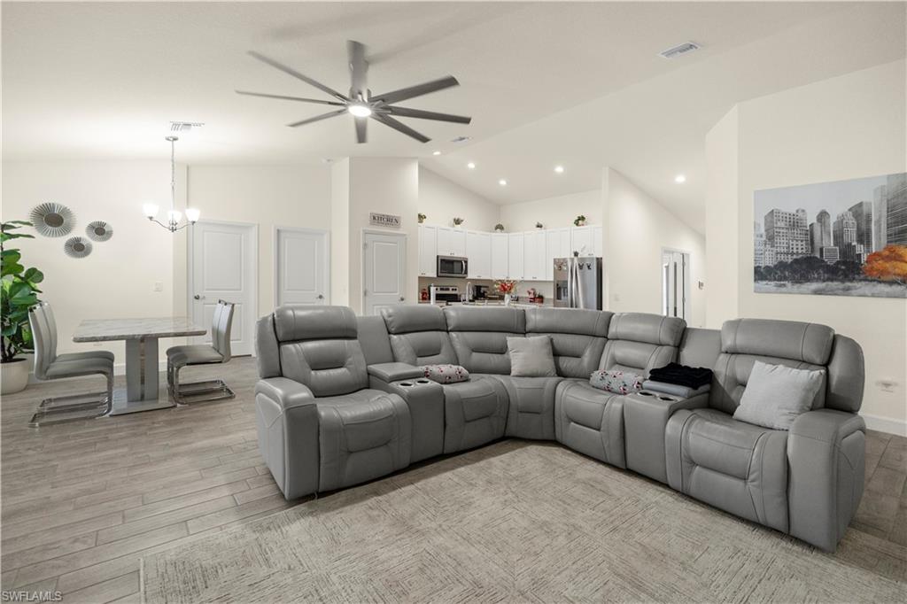 2512 20th Street Southwest Lehigh Acres, FL 33976 - Photo 14 of 48 a living room with furniture