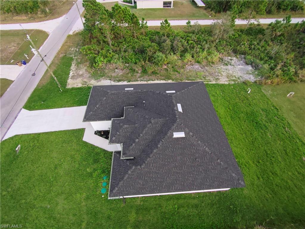 2512 20th Street Southwest Lehigh Acres, FL 33976 - Photo 2 of 48 an aerial view of a house