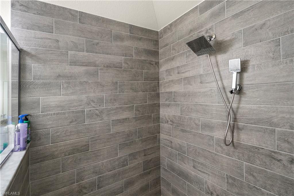 2512 20th Street Southwest Lehigh Acres, FL 33976 - Photo 36 of 48 a bathroom with a shower