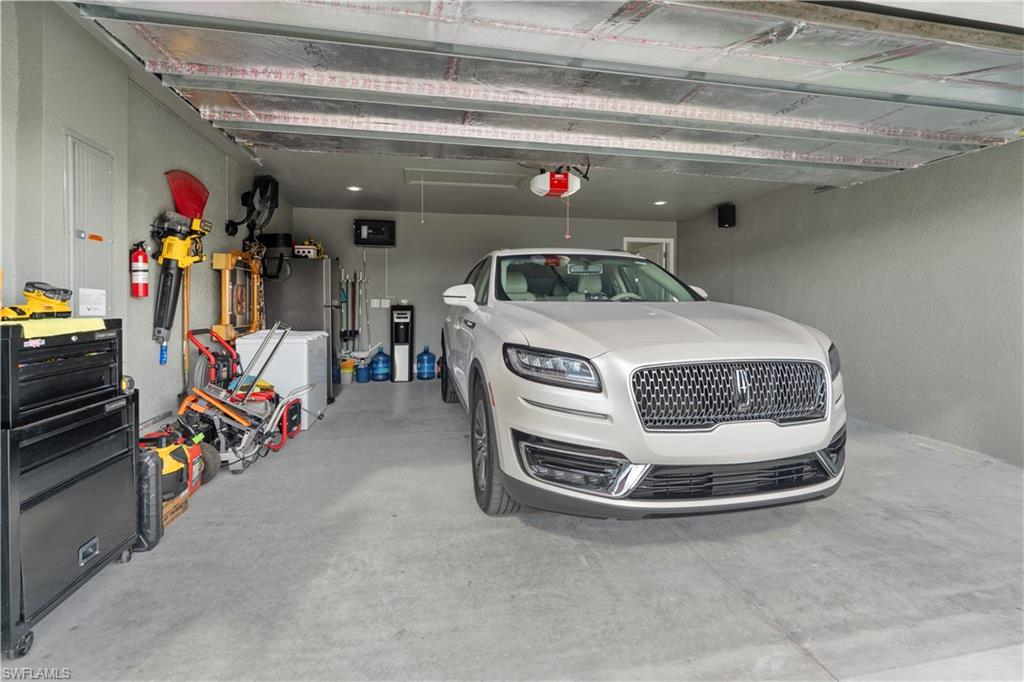 2512 20th Street Southwest Lehigh Acres, FL 33976 - Photo 42 of 48 a view of car garage