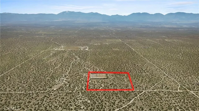 a view of an ocean and a mountain