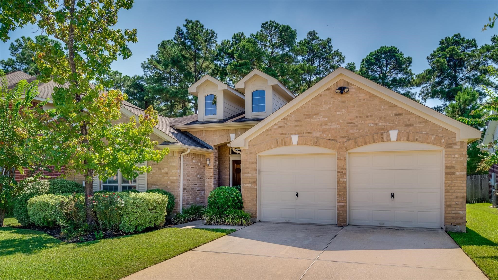 3419 La Fleur Lane Spring, TX 77388 - Photo 3 of 26 a front view of a house with a garden