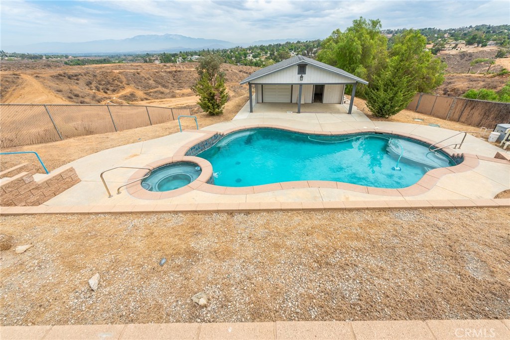 17033 Andromeda Lane Riverside, CA 92504 - Photo 48 of 57 Pool house with full bathroom and storage. Possible ADU