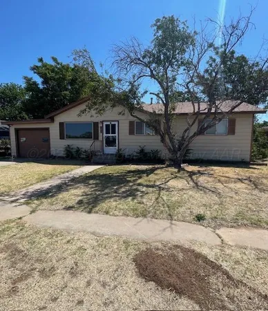 a house with trees in the background