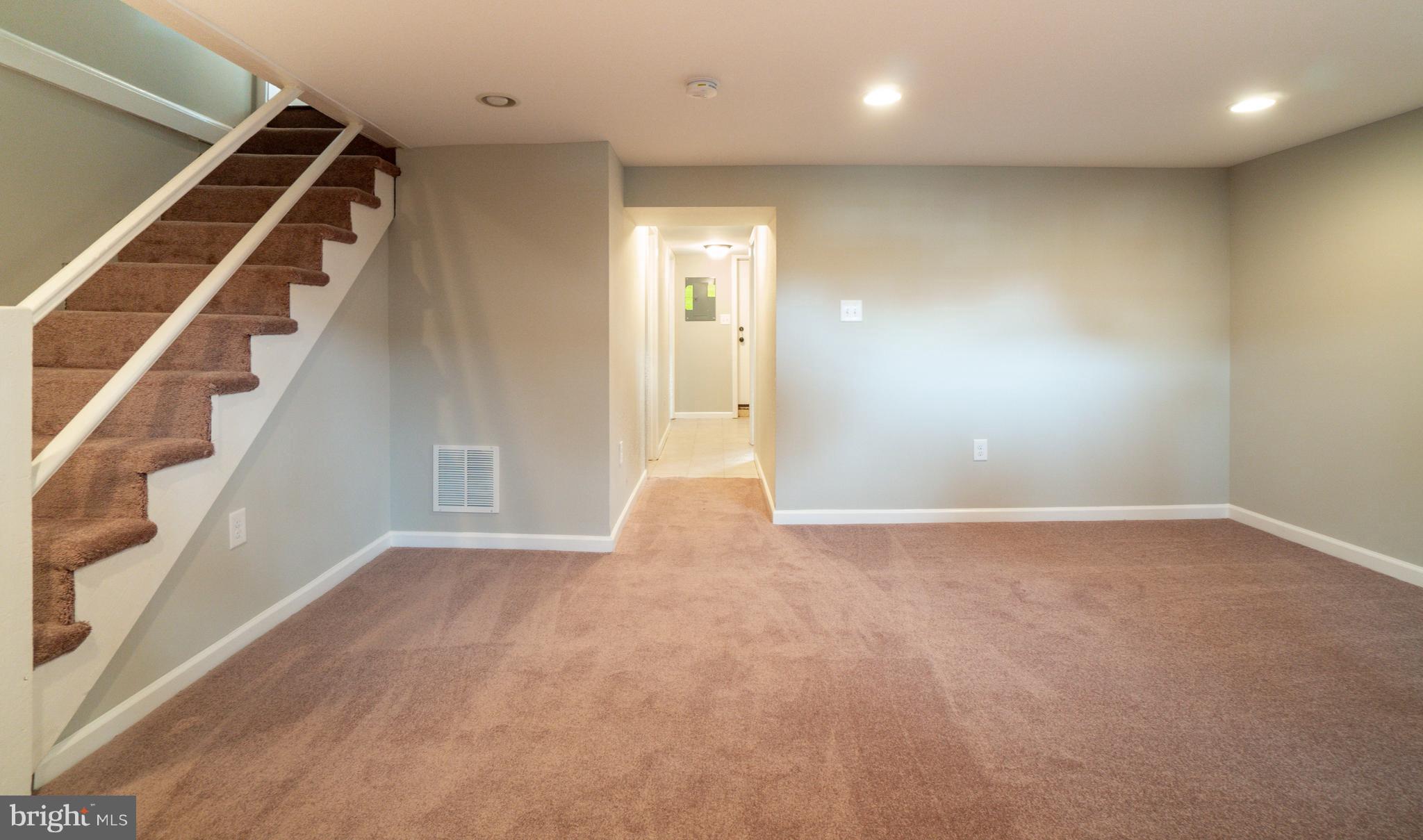 1419 Stonewood Road Baltimore, MD 21239 - Photo 23 of 28 Spacious Finished Basement with Recessed Lighting