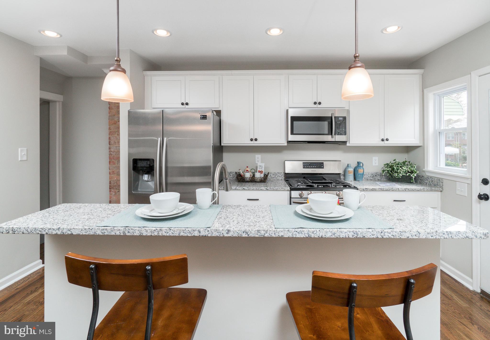 1419 Stonewood Road Baltimore, MD 21239 - Photo 8 of 28 Kitchen Island/Breakfast Bar