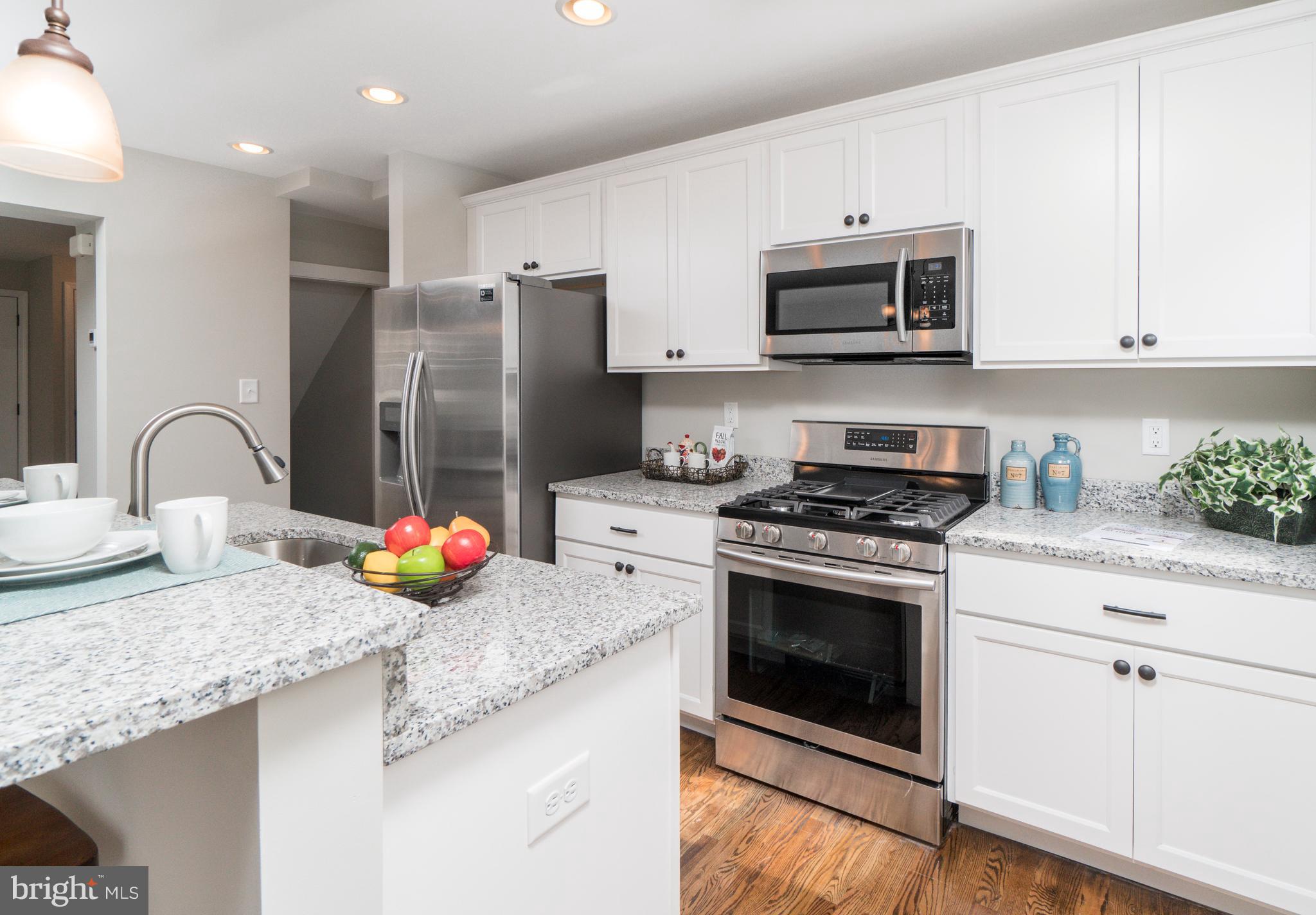 1419 Stonewood Road Baltimore, MD 21239 - Photo 9 of 28 Kitchen With Stainless Steel Appliances