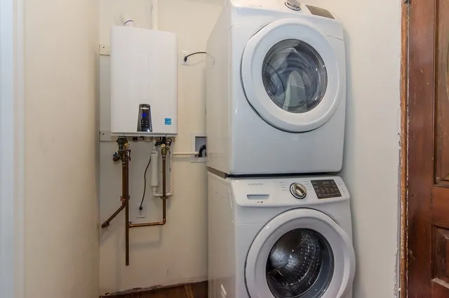 a utility room with dryer and washer