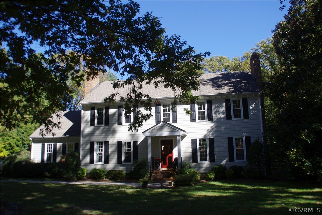 front view of house with a yard