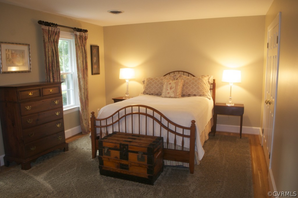 2001 Castlebridge Road Midlothian, VA 23113 - Photo 17 of 21 a bedroom with a bed a table and chair