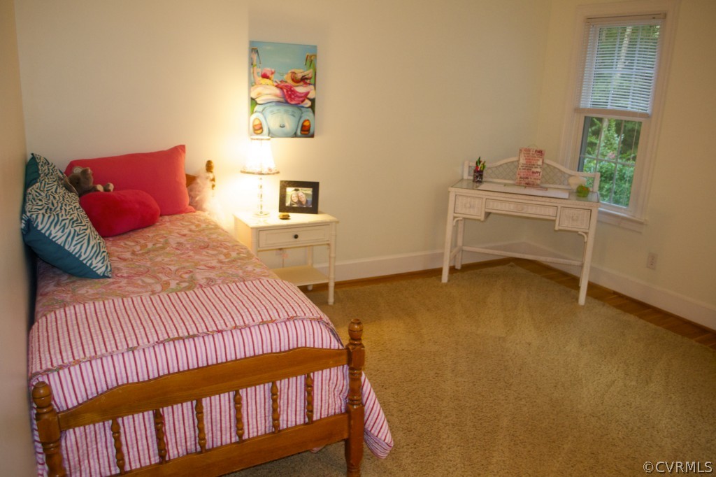2001 Castlebridge Road Midlothian, VA 23113 - Photo 20 of 21 a bedroom with a bed and a table in it