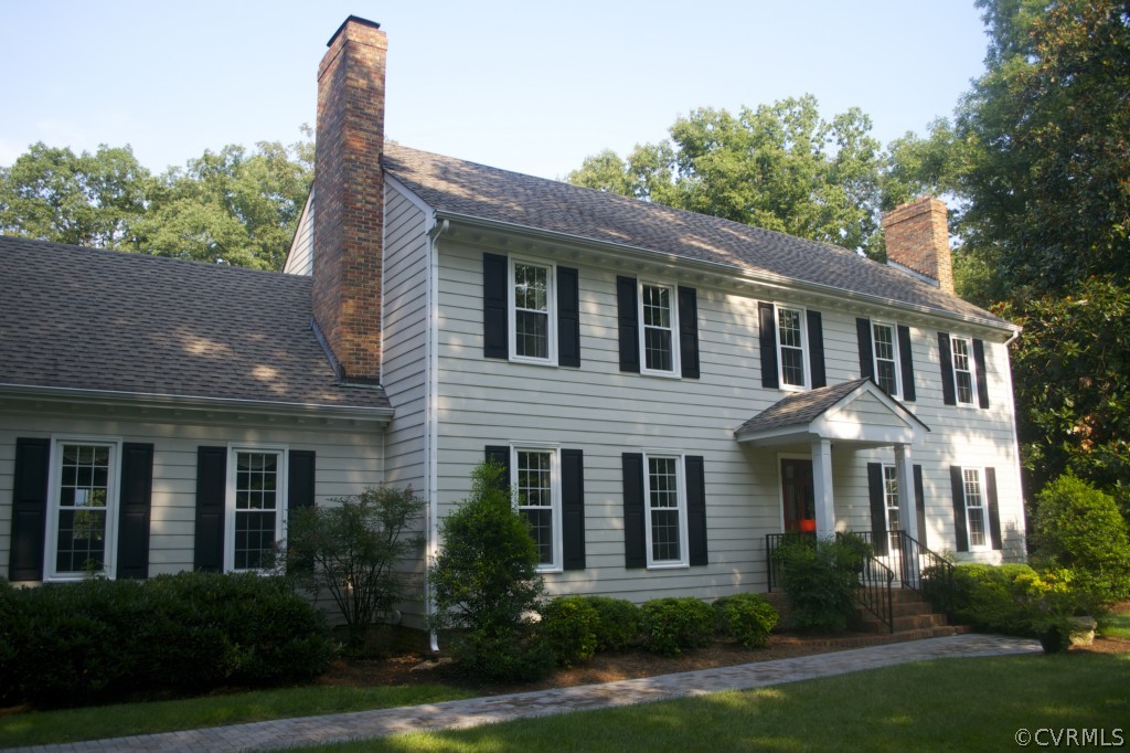 2001 Castlebridge Road Midlothian, VA 23113 - Photo 2 of 21 a front view of a house with garden