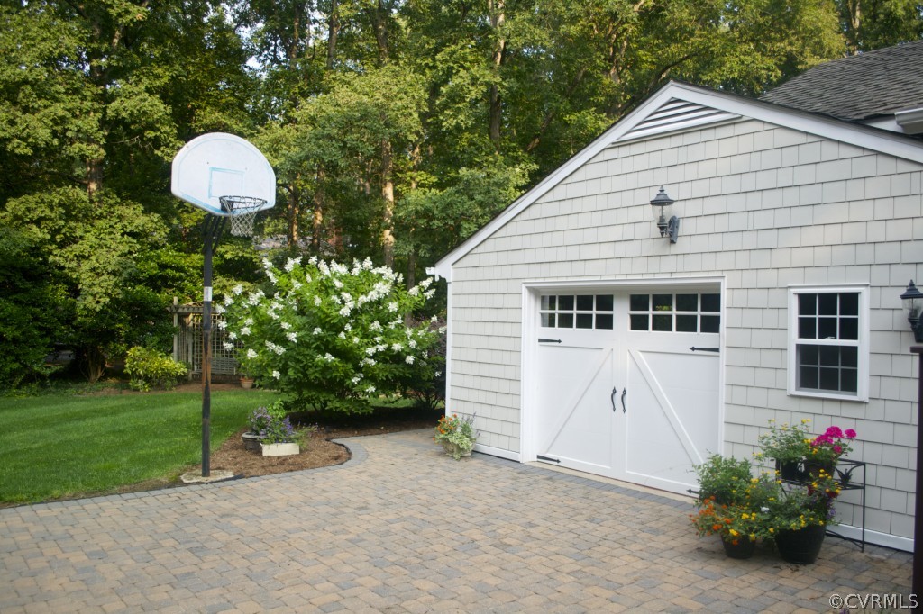 2001 Castlebridge Road Midlothian, VA 23113 - Photo 4 of 21 a front view of a house with a yard and garage