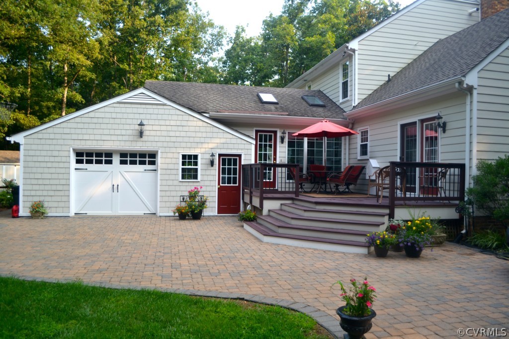 2001 Castlebridge Road Midlothian, VA 23113 - Photo 5 of 21 a view of a house with a patio and a yard