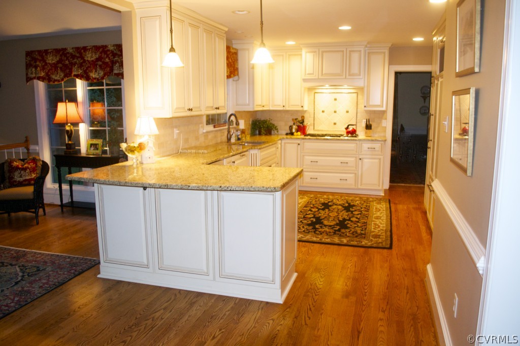 2001 Castlebridge Road Midlothian, VA 23113 - Photo 10 of 21 a large kitchen with kitchen island granite countertop a large window and stainless steel appliances