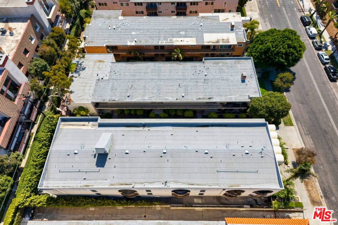 8346 Manitoba Street, Unit 11 Playa del Rey, CA 90293 - Photo 9 of 14 a view of building with wooden floor