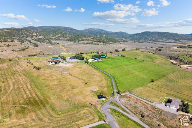 6117 North Rocky Ridge Road Peoa, UT 84061 - Photo 79 of 83 Drone / aerial view featuring a rural view and a mountain view