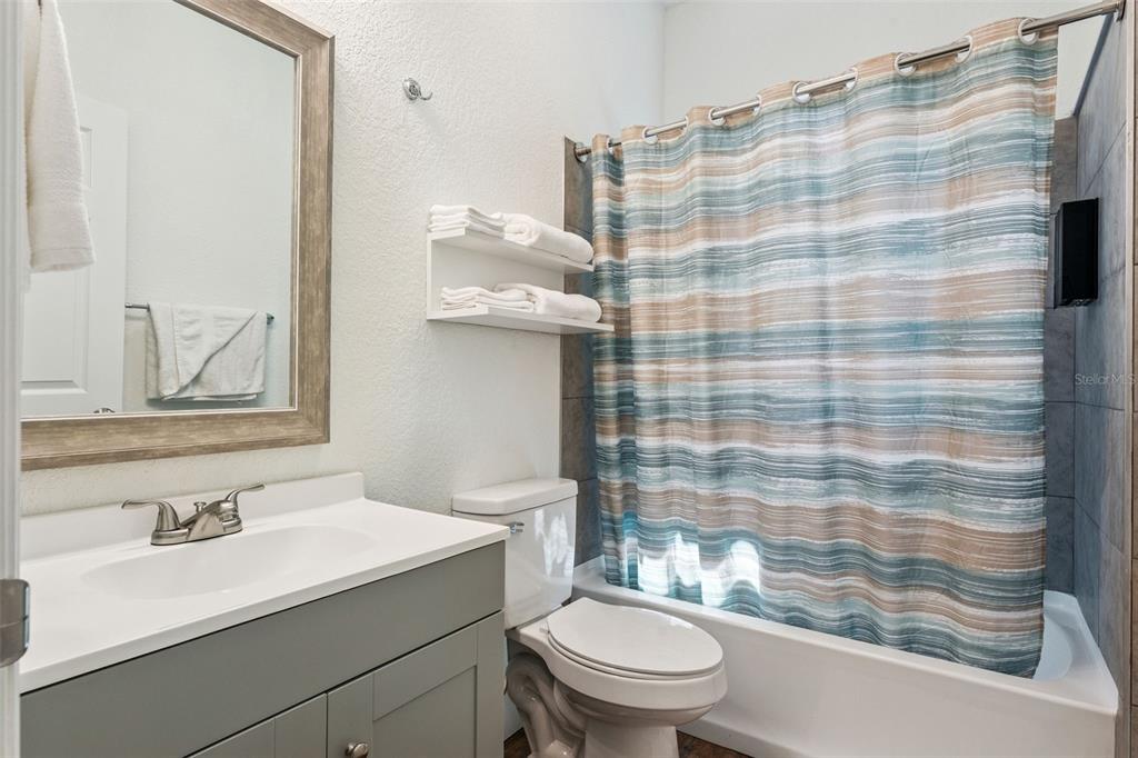 145 Ruth Avenue Cocoa, FL 32922 - Photo 12 of 23 a bathroom with a sink toilet and shower