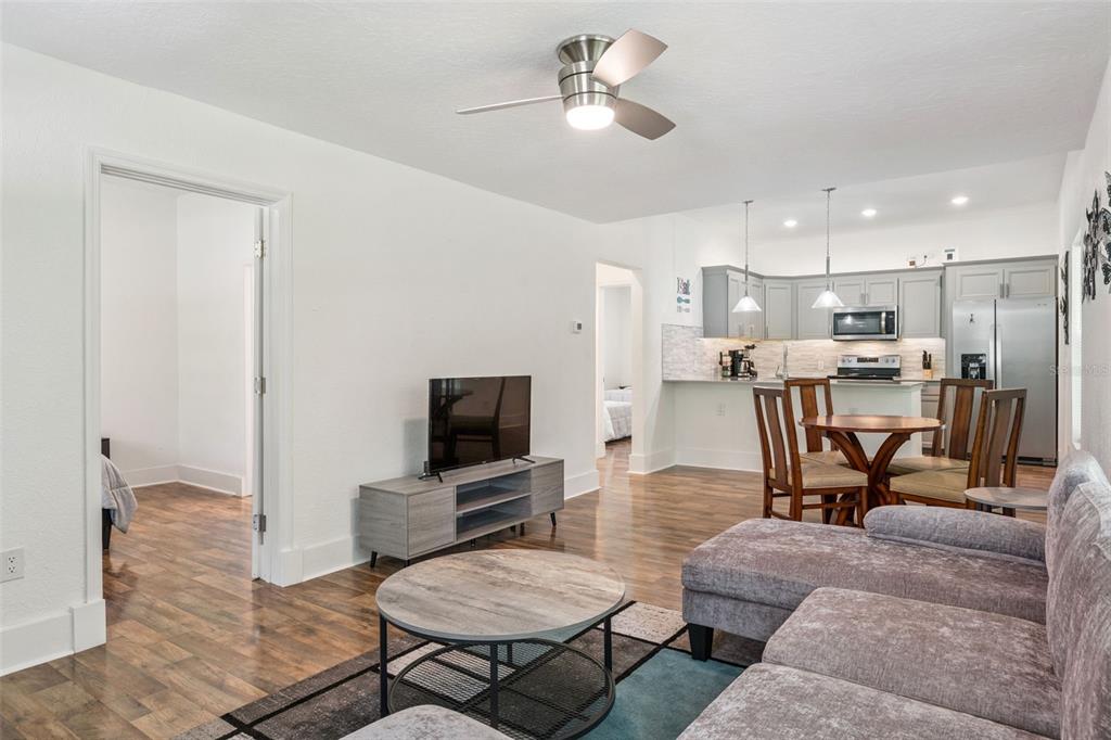 145 Ruth Avenue Cocoa, FL 32922 - Photo 6 of 23 a living room with furniture and a flat screen tv