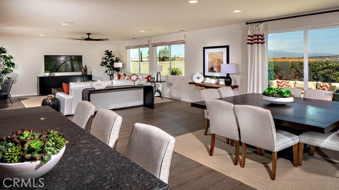 14080 Versimo Lane Beaumont, CA 92223 - Photo 6 of 20 a living room with furniture and a flat screen tv