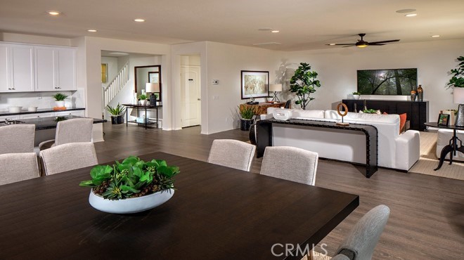 14080 Versimo Lane Beaumont, CA 92223 - Photo 7 of 20 a living room with furniture and a large window